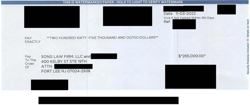 Settlement Check Redacted Final — Song Law Firm