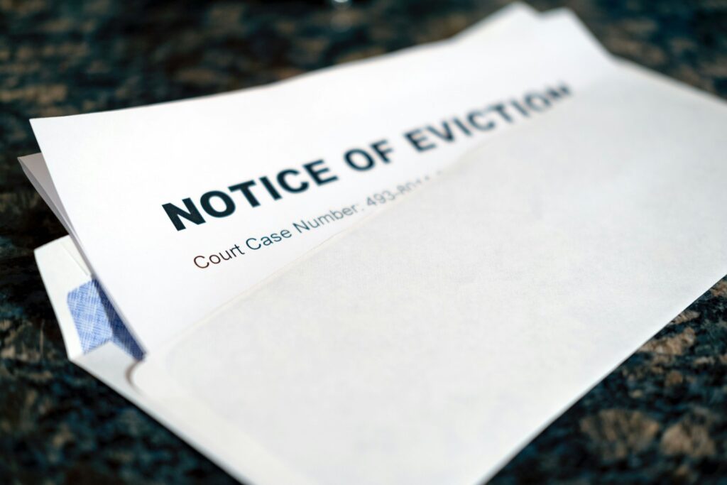 a close up of a piece of paper with a notice of eviction on it