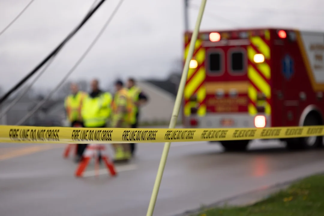 Emergency responders and fire truck at car accident scene — Personal Injury legal column