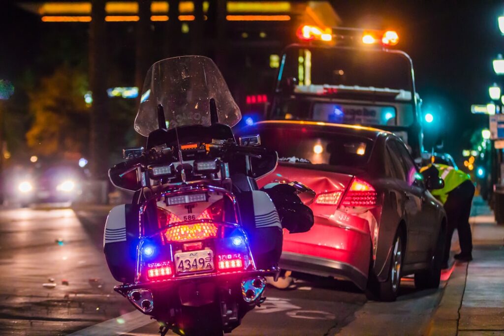 Policeman at car window — DUI victim claim and Dram Shop liability