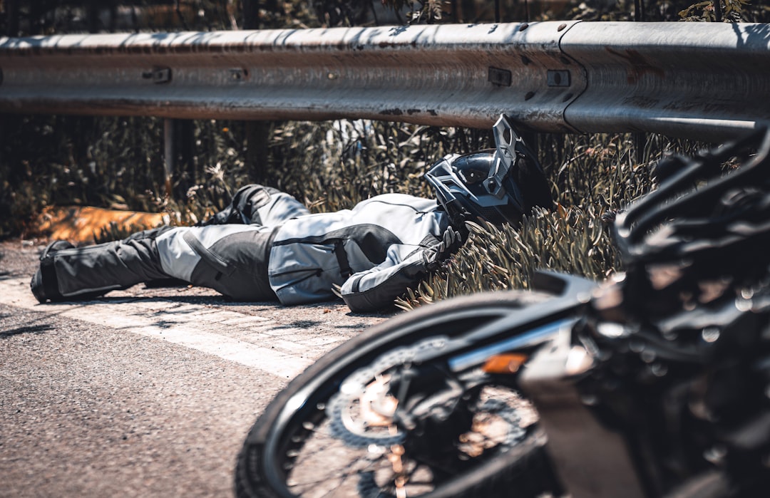 a person lying on a bench — Photo by Mehmet Talha Onuk on Unsplash