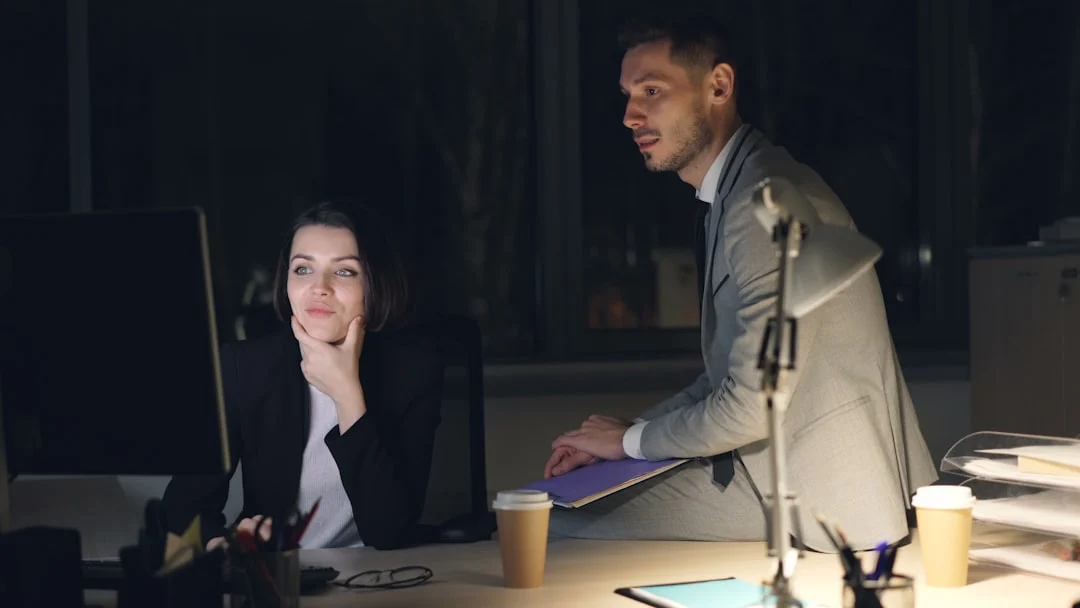 Two colleagues working late at the office. — Photo by Vitaly Gariev on Unsplash