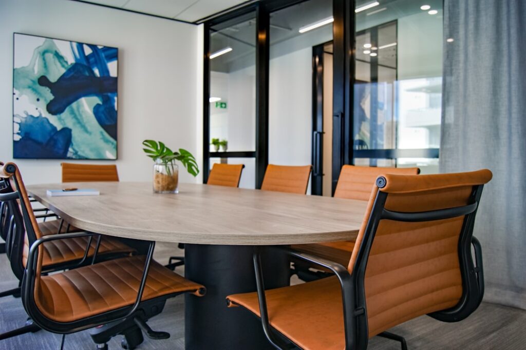 Empty executive conference table representing NJLAD age discrimination senior executive wrongful termination case