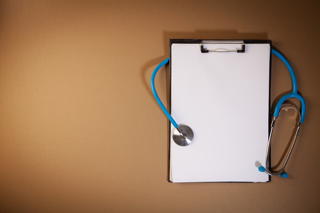 Clipboard with stethoscope - MedPay medical bill paperwork PIP