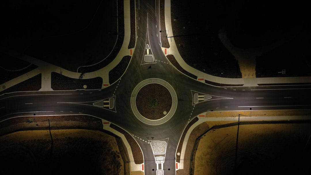 Overhead view of intersection at night - T-bone side-impact intersection collision