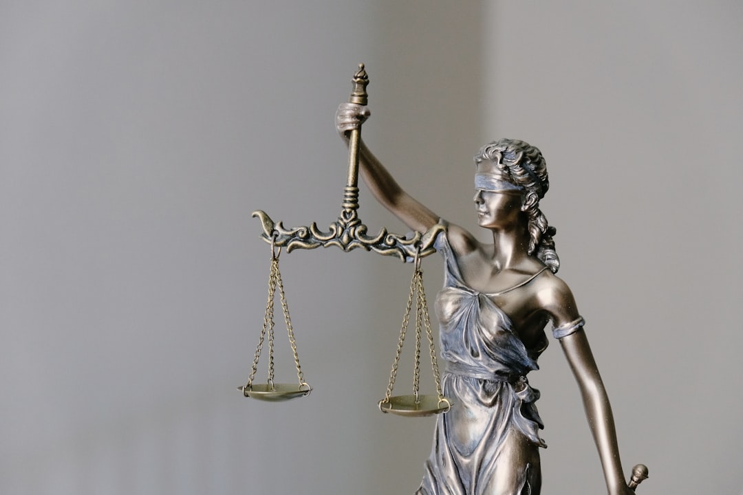Lady Justice balance scale representing NJ 51 percent modified comparative negligence rule