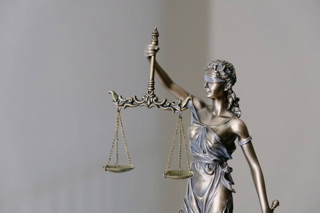 Lady Justice balance scale representing NJ 51 percent modified comparative negligence rule