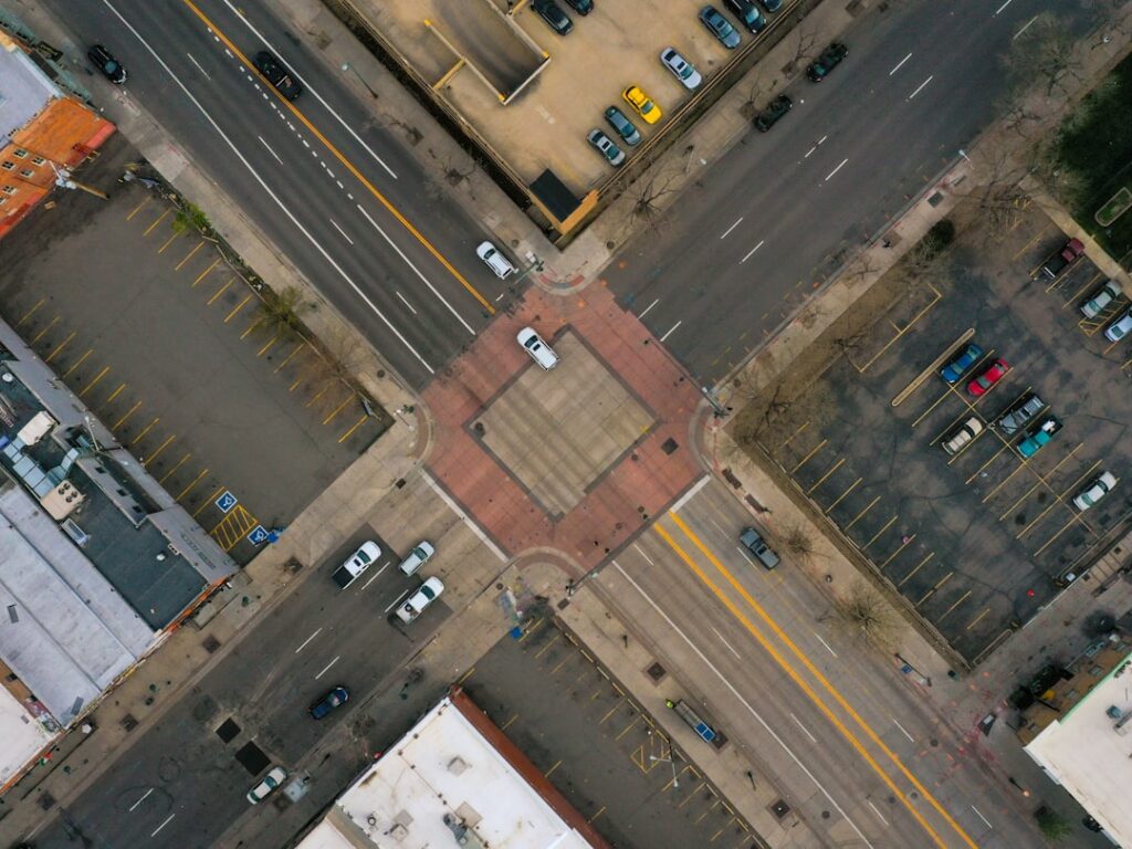 an aerial view of a city street intersection