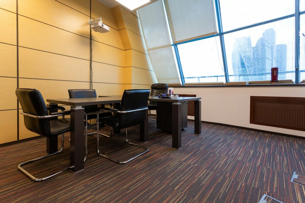 black and gray office rolling chairs